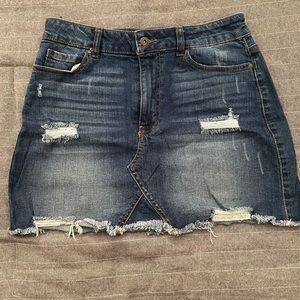 Jean skirt with fringe detailing